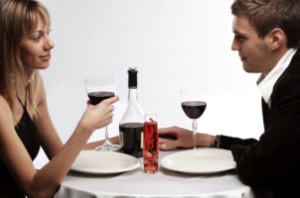 Young beautiful couple having a dinner in a restaurant